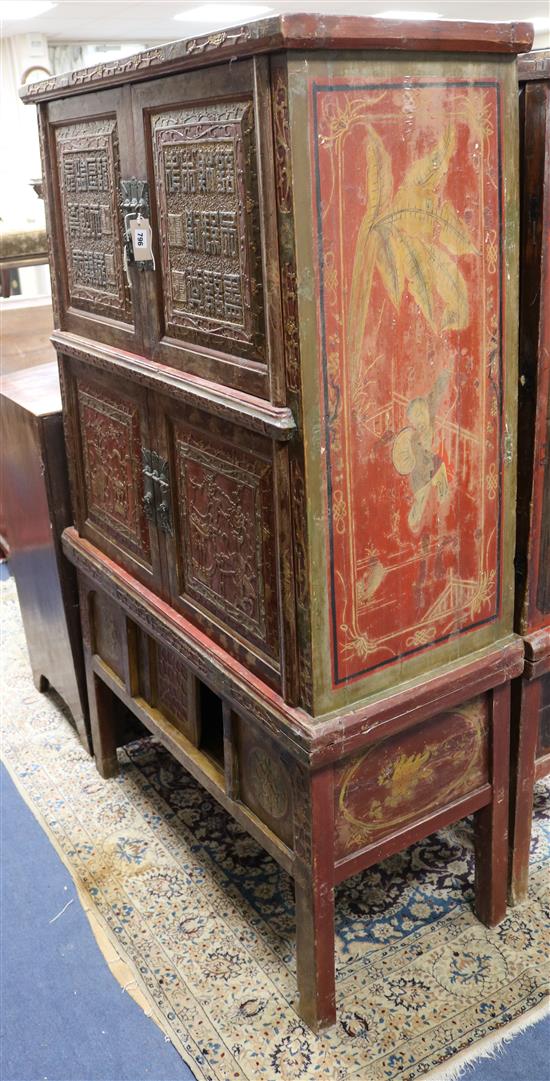 A 19th century Chinese carved and lacquered wood cabinet on stand W.104cm